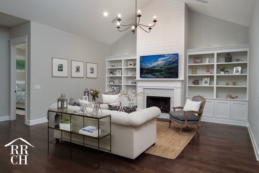Custom Home Build Longleaf Living Area with Shiplap TV Wall with Fireplace and Custom Built-Ins Surrounding TV | Robinson Renovation & Custom Homes, Inc. - Challenges in Home Remodeling
