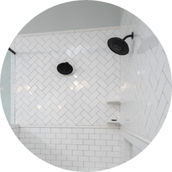 Geometric Designs Bathroom Remodeling Trend Subway Tile Pattern with Black Fixtures