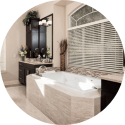 Sustainability Bathroom Remodeling Trend Glass Shower Half-Wall Freestanding Tub Black Fixtures
