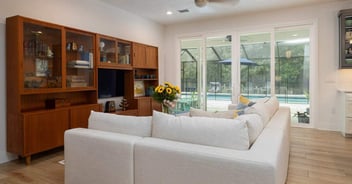 Image of a living room with glass patio door in a ADU by Robinson Renovation and Custom Homes