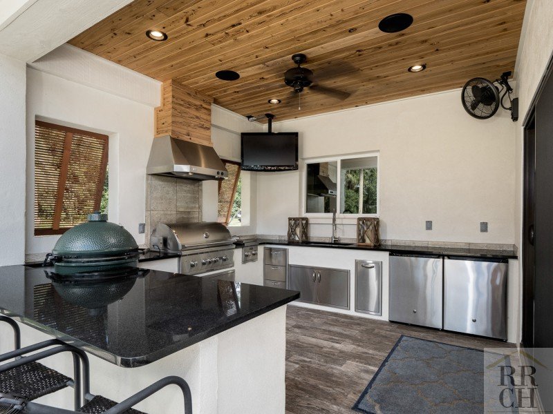 outdoor kitchen with black granite countertops - Robinson Renovations - Gainesville Fl Design Build Remodeler and Custom Home Builder