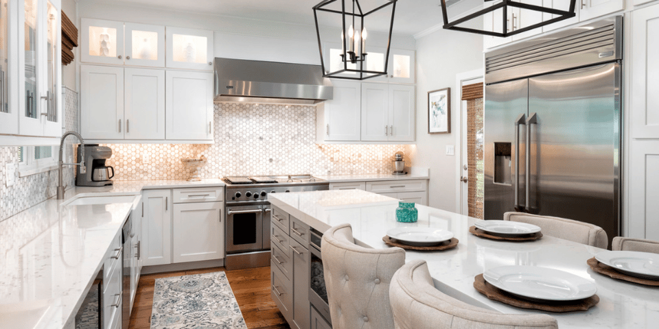 Kitchen Renovation in Gainesville with Penny Tile Backsplash and Large Island with Seating