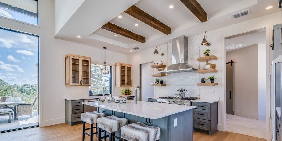 intricate exposed beam ceiling with recessed lighting