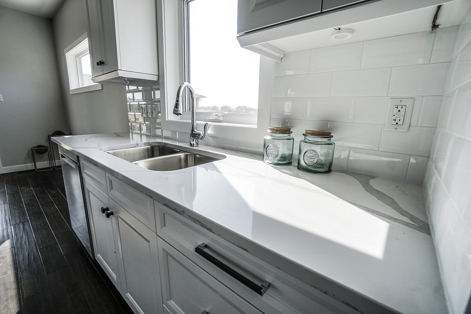 Counter-Luxury-Counter-Top-White-Kitchen-Kitchen-How to Design a Kitchen - Robinson Renovations and Custom Homes - Gainesville Fl Design Build Remodeler and Custom Home Builder