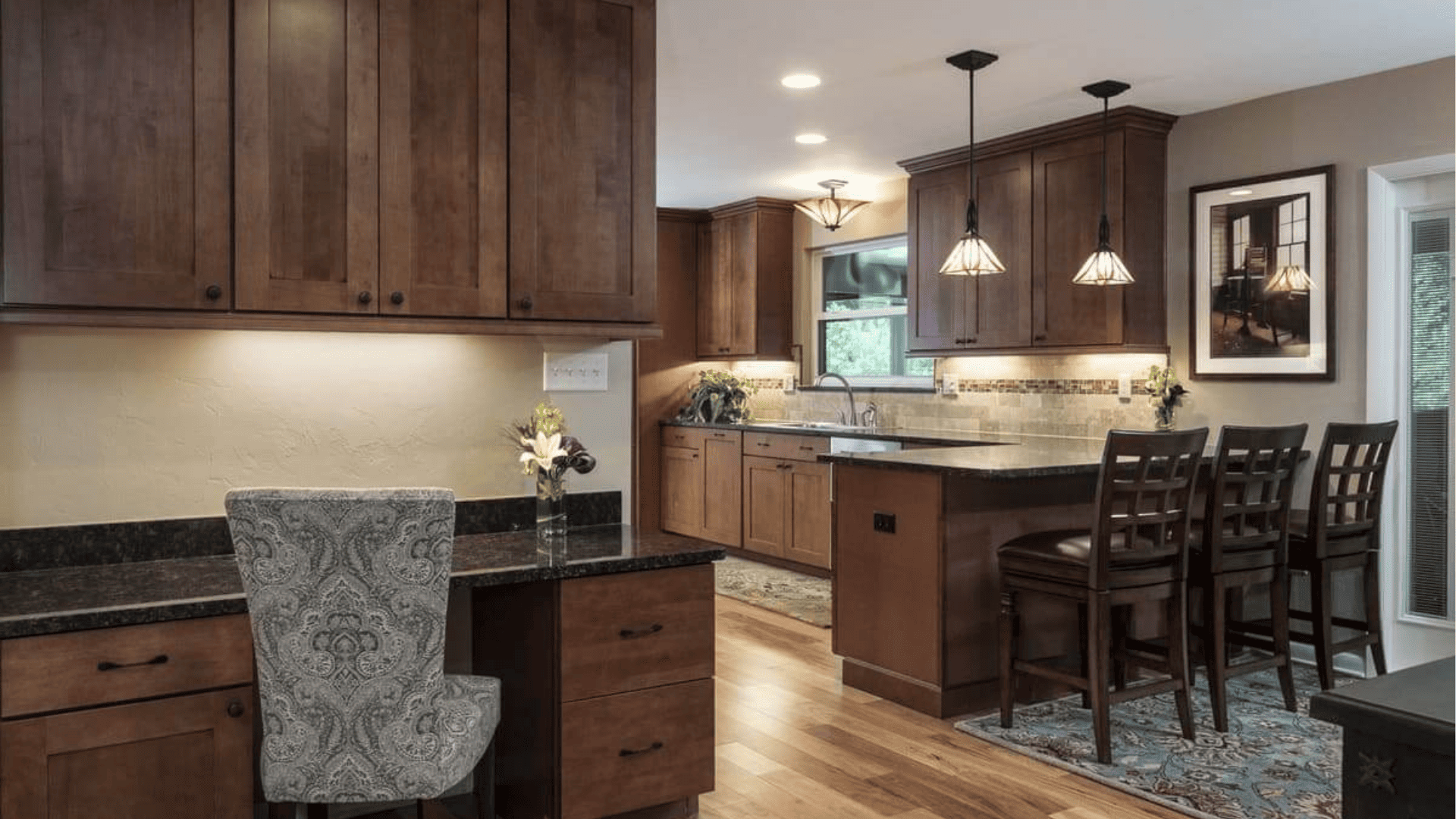 Elegant wooden kitchen with handcrafted cabinetry and premium wood finishes - Robinson Renovations - Gainesville Fl Design Build Remodeler and Custom Home Builder