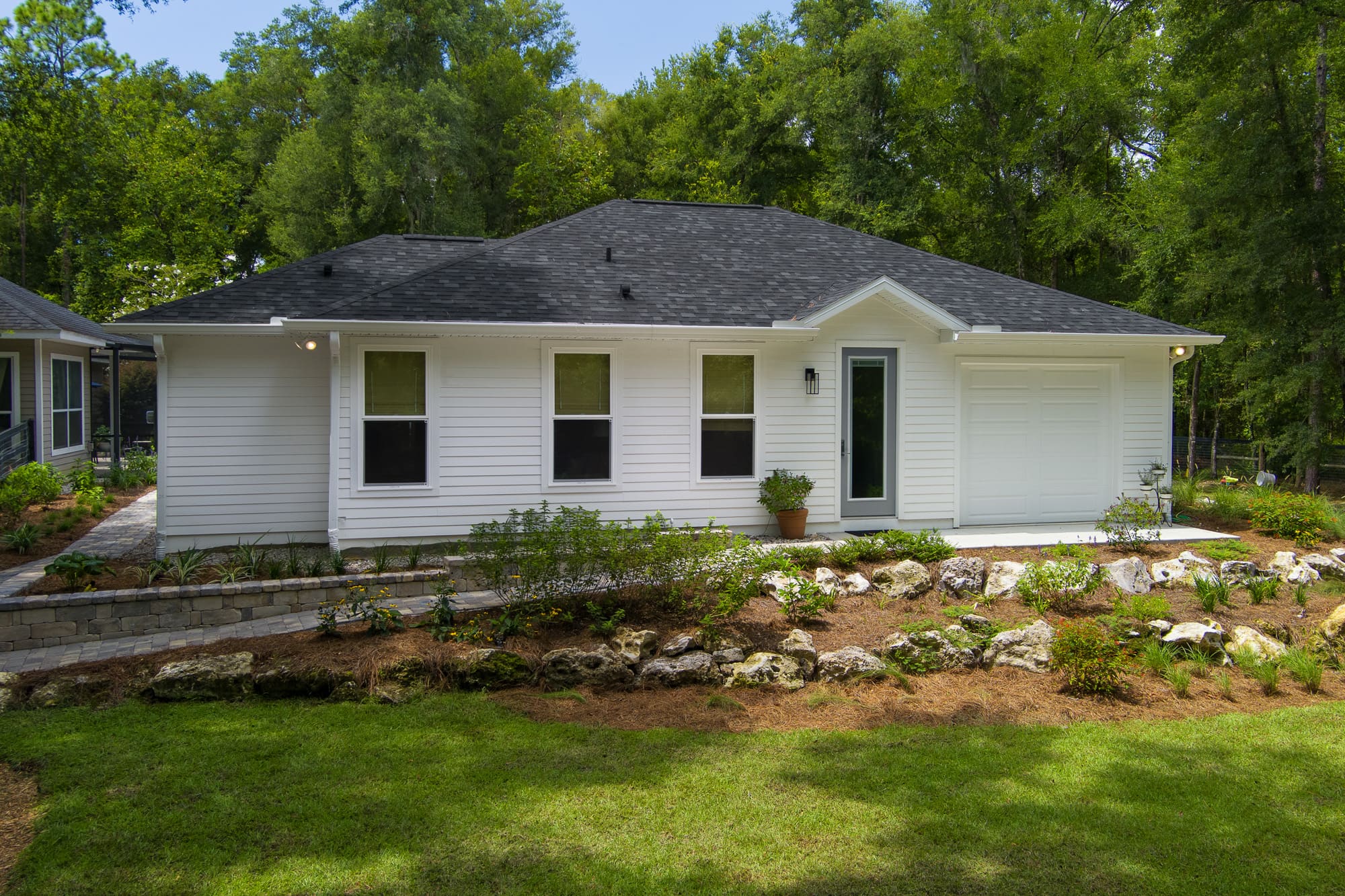 Custom built ADU with front-entry garage in a backyard setting - Robinson Renovations - Gainesville Fl Design Build Remodeler and Custom Home Builder