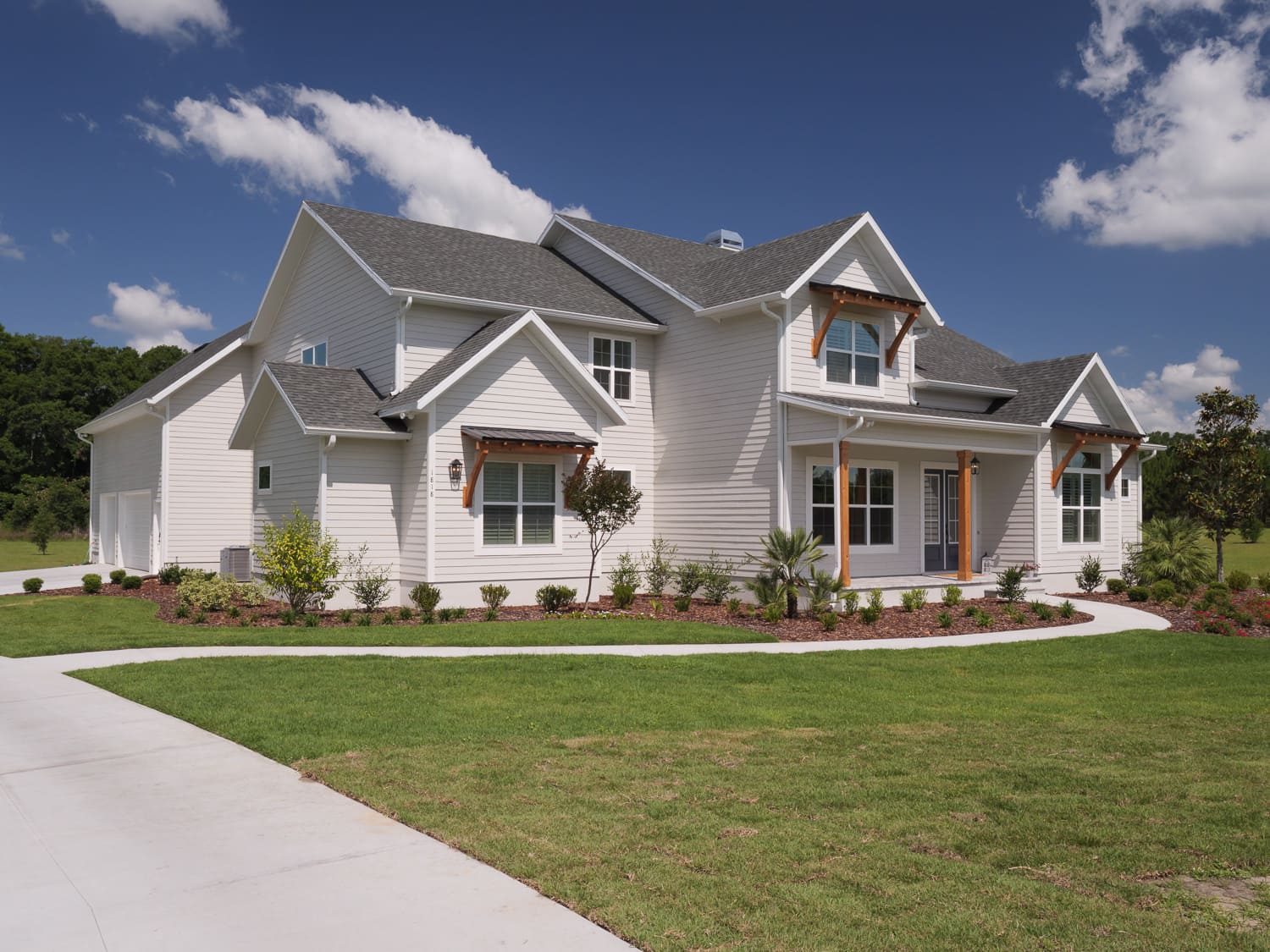 Front Elevation Design Exterior or Design-Build Custom Home with Beautiful Landscape and Hardscape | RRCH, Inc. - Remodeling Projects That Will Increase Your Home Value