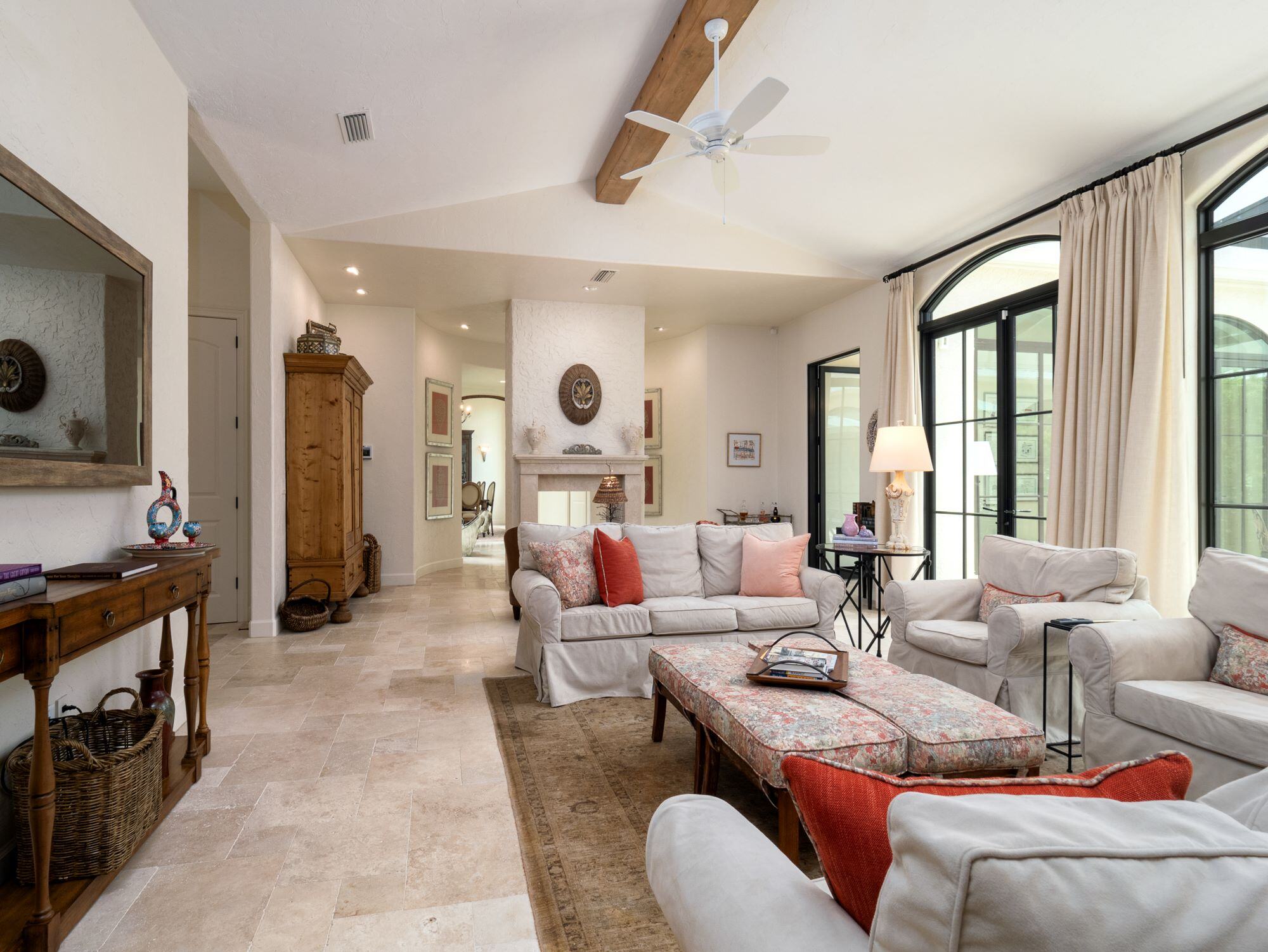 Living Room with Floor to Ceiling Windows and Luxury Stone Floor in Custom Alachua County Home - The Ultimate Guide to Whole-Home Remodeling - Robinson Renovations - Gainesville Fl Design Build Remodeler and Custom Home Builder