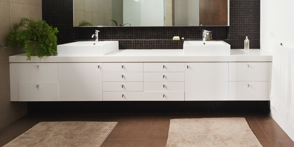 Stock Image of Warm White Floating Vanity in Bathroom Remodel