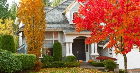 Florida-style custom home with arched entry in Alachua County by Robinson Renovation and Custom Homes