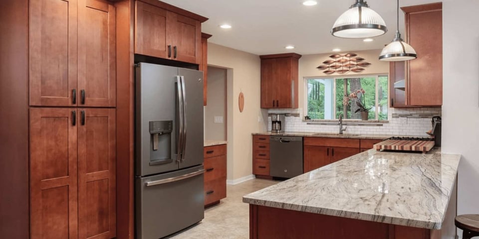 Kitchen renovation in Alachua County FL featuring subway tile and stainless appliances by Robinson Renovation and Custom Homes
