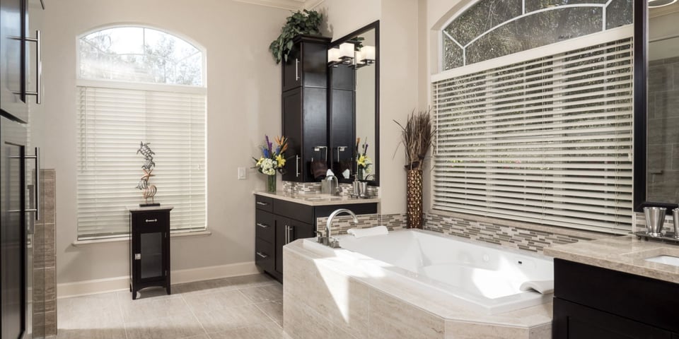 Modern Bathroom Remodel Natural Stone Jacuzzi Bathtub Black Cabinetry - Bathroom Trends 2025 Gainesville Fl Design Build Remodeler Custom Home Builder